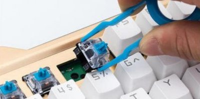 ​键盘连键怎么处理